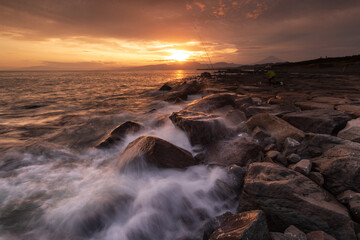 Obraz premium 富士山と夕日と波