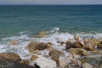 Fototapeta na wymiar Rocks in the sea with waves