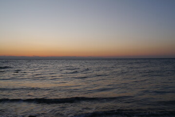 Fototapeta na wymiar Colorful sunrise on the sea