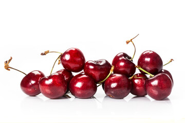 fresh organic cherries isolated on white background