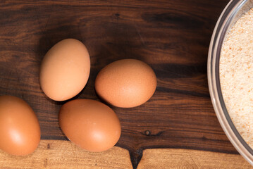 eggs and breadcrumbs for cooking, healthy living and lifestyle, kitchen tidiness, selective focus