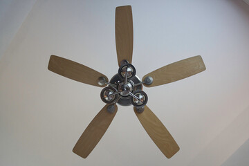 Wood and metal ceiling fan with three lights