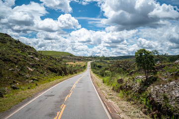open asphalt road in natural mountain landscape