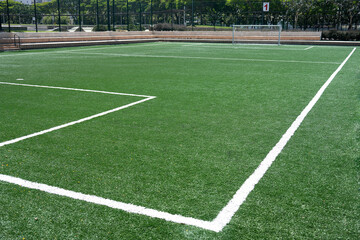 Empty synthetic soccer field.