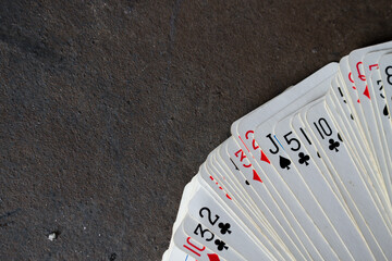 Playing cards on black background