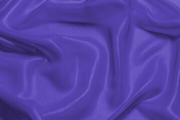 Rich and luxury red silk fabric texture background.