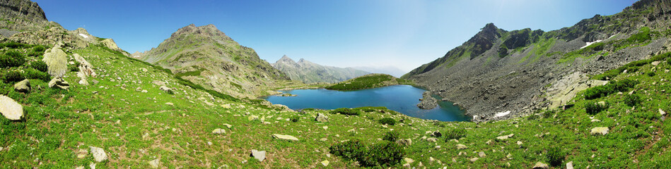 Fototapeta na wymiar landscape with sky, lake and grass