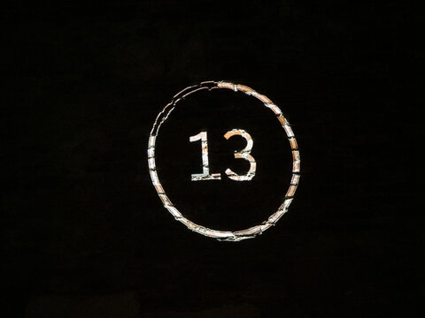 13 projected number on wall