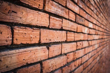 The walls built with clay bricks, old.
