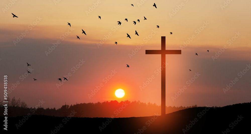 Wall mural Christian cross on hill outdoors at sunrise. Resurrection of Jesus. Concept photo. - Wall murals