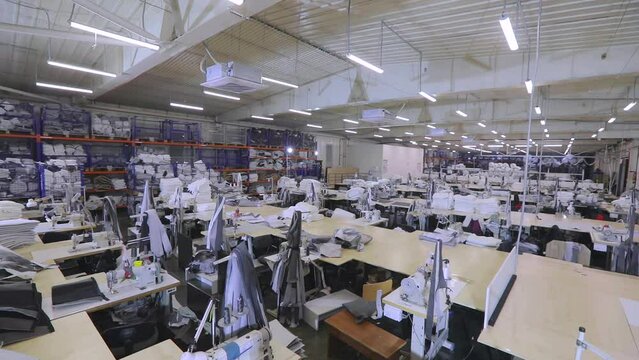 Panorama of a large sewing workshop. An empty sewing workshop. Large sewing production