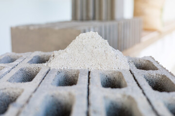 Cement or mortar, Cement mix or cement powder with a trowel put on the brick for construction work.