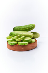 Close-up of fresh young cucumber isolated on a white background