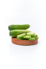 Close-up of fresh young cucumber isolated on a white background