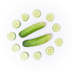 Close-up of round-cut cucumber isolated on a white background