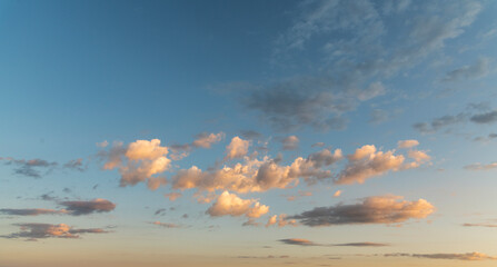 Beautiful bright sunrise with clouds. Sky background.
