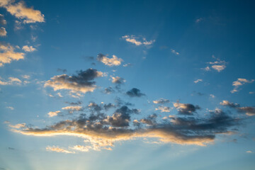 Naklejka na ściany i meble Beautiful bright sunrise with clouds. Sky background.