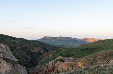 Beautiful landscape in the morning. Panoramic view on the mountains and hill at the sunrise.