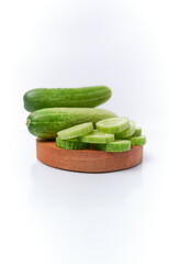 Close-up of fresh young cucumber isolated on a white background