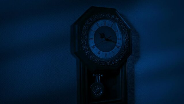 Scary Shadows Creeping Over Antique Clock At Night
