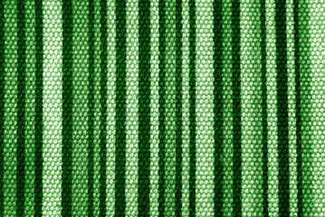 close up of the stripped green fabric texture background
