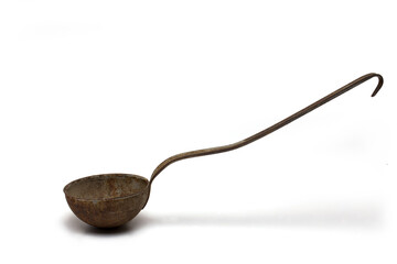 side closeup rusted old ladle white background