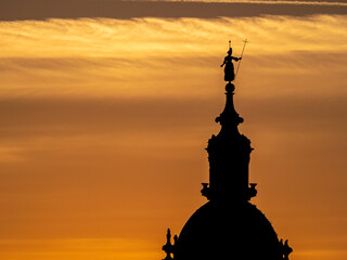 Beautiful sunset in Bilbao, city of the Basque country, with the silhouette of the church of San Anton.