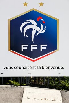 Macon, France - June 3, 2021: Emblem of the french national football team and federation on a wall