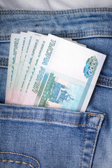 Russian rubles in the pocket of jeans