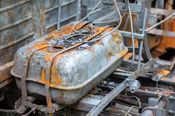Broken and burned cars in the parking lot, accident or deliberate vandalism. Burnt car....