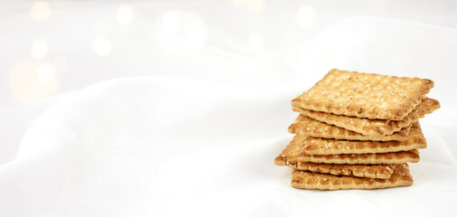 Crispy cracker according to recipes. Sweet cookies on a bun background