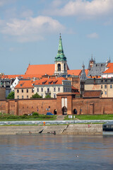 View from the Vistula River of the Old Town with 18th century Church of the Holy Spirit, Toun, Poland