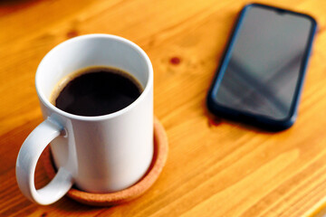 Fototapeta na wymiar cup of coffee on a table
