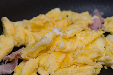 Closeup of scrambled eggs with a shallow depth of field