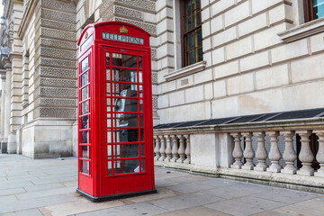 Fototapeta na wymiar Red telephone box (booths) in London
