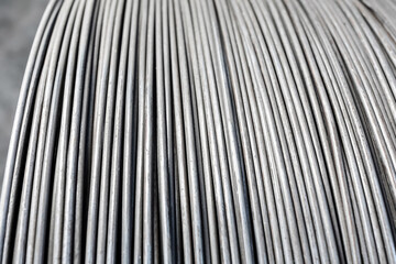 Iron wire in roll. Warehouse of metal products. Close-up