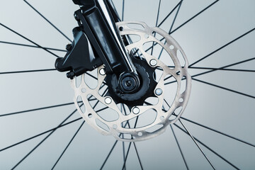 Bicycle brake rotor with hydraulic caliper. Brake system on a gravel bike