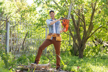 Man cutting a branch with chainsaw