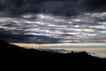 clouds over the hills, wide angle landscape photo