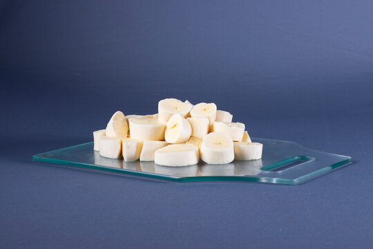 Photo of brazilian food called mandioca aipim cassava, pieces cut from the peeled root