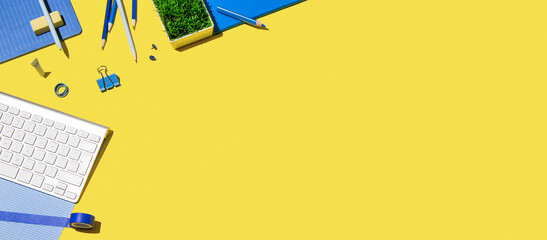 School background. Various school supplies on yellow background. Surreal composition. Stylish banner.	
