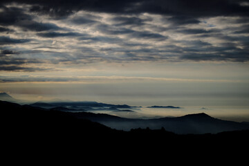 clouds over the hills, wide angle landscape photo