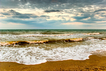 the evening sea landscape at the stormy weather, Azov sea, Ukraine