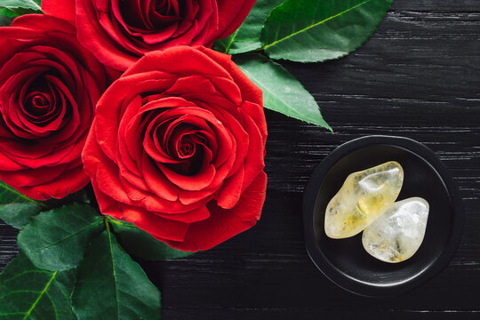 Red Roses and Citrine on Black Background
