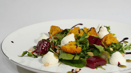 Salad with herring, beetroot, paprika, red onion, mustard and balsamic vinegar. Salad of lettuce,...