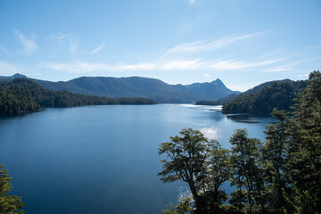 Fototapeta na wymiar Beautiful landscape with calm lake, blue sky and mountains in La Patagonia, Argentina