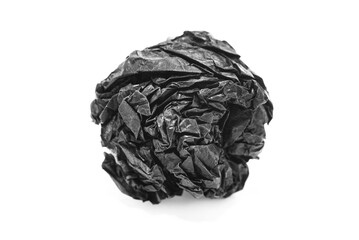 Paper. Crumpled ball of black paper on a white background