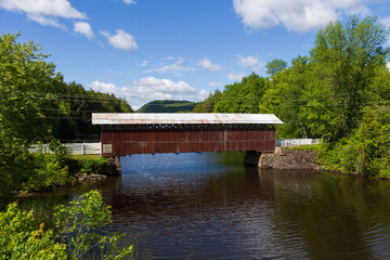 Fototapeta na wymiar The 1881 Narrow Covered Bridge over the narrowest part of Fitch Bay on Lake Memphremagog, Stanstead, Quebec, Canada