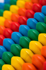 children's toy wooden abacus with multicolored knuckles, isolated on a white background