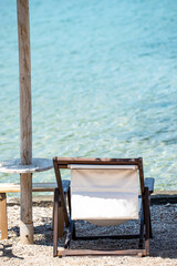 wooden chair on the beach, greece, grekland, europe, eu